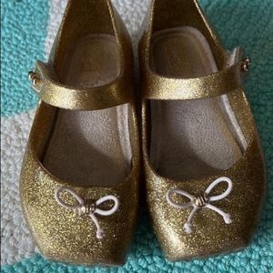 Gold bow mini Melissa sparkle shoes